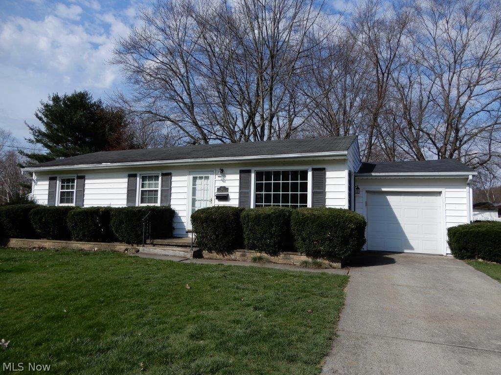 Cute as a button Munroe Falls ranch, price under market to sell quickly! 3 bedrooms, 1 full bath, full basement, 1 car attached garage. Nice eat-in kitchen opens to a nice sized living room. Full basement is partially finished. Updated plumbing and new sump pump, vinyl windows, Enjoy entertaining on the back patio, and in the large fenced in back yard. Hardwood flooring under carpeting! Immediate possession.