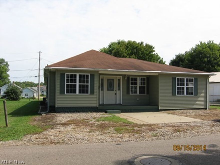 It's bigger inside than it looks! Home has 4 bedrooms and a full bath, with laundry on the first floor. Attached is a 3 car garage with 2 overhead doors, a full bath, and its own furnace and hot water tank. There is an enclosed breeze way separating the home and garage. Could be a great set up for someone looking to start a business! Basement is partially finished into 2 rooms. Home needs minor repairs, such as painting. Home is listed under the Freddie Mac First Look Program through 10/4/2014.  During this time, investor purchases will not be accepted. All offers required pre-approval letter or proof of funds. Earnest money will be required upon acceptance.