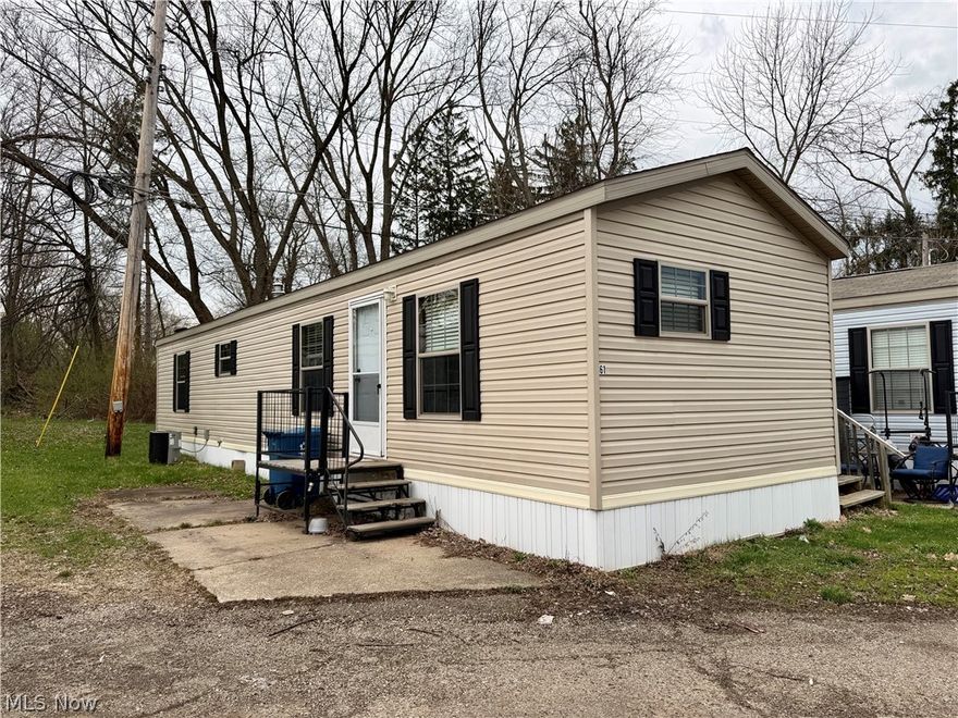 Check out this modern one-story mobile home in Massillon! Built in 2021, the open floor plan includes a large living room, a spacious eat-in kitchen that’s fully applianced with tons of cabinet space, a sizable master bedroom, and a spare bedroom or office. The roomy full bathroom features a large soaking tub/shower and stackable laundry hookups for added convenience. Enjoy affordable, low-maintenance living in this quiet neighborhood, located just minutes from Downtown Massillon. The home can also be relocated if desired. Call today to schedule your private showing!