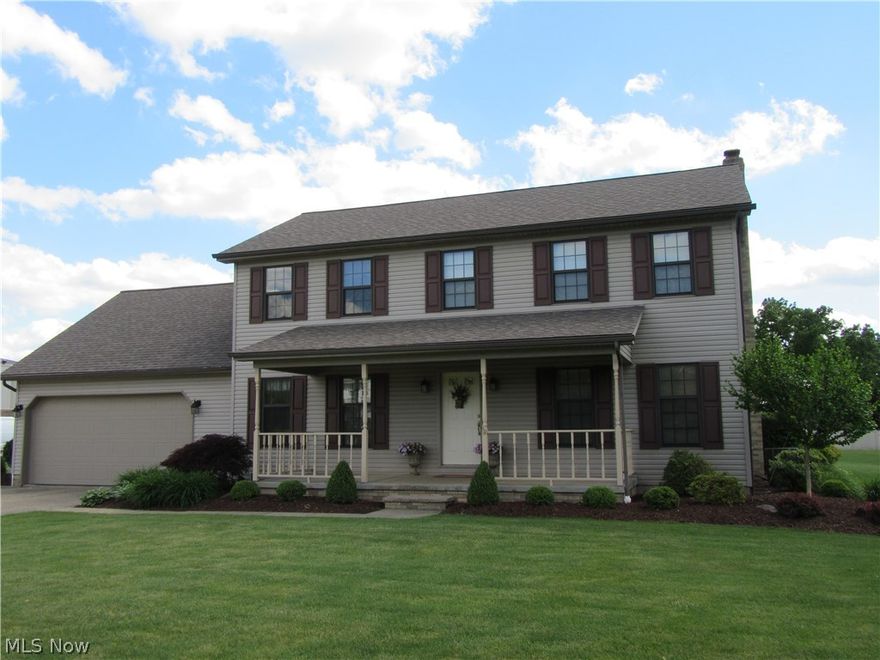 Great time to buy this beautiful home with 2249 sq ft on a well manicured .8 acre lot with a front porch and back deck. Living room with gas fp. Nice eat in kitchen with new solid surface counter tops. Large first floor home office or den. Dining room. 1st floor laundry. Oversized 2 car garage. Lovely master bedroom & large bath with new sinks. 2 additional bedrooms & bath. Lower level rec room. Central air, city utilities. Immediate possession.