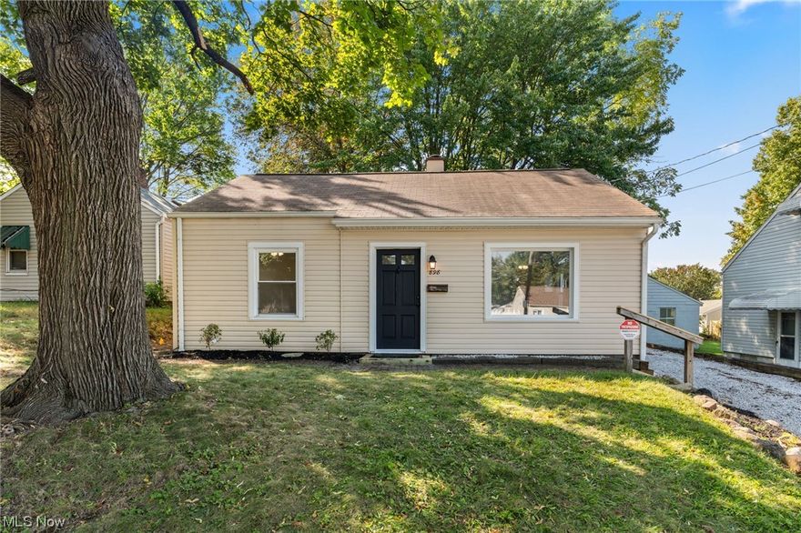 Beautifully updated home in Firestone Park. New Kitchen with **shaker cabinets**, black accents and new hardware, **new countertop tops** with deep double bowl sink, and **luxury vinyl plank**(waterproof) throughout kitchen, living room, and bath. *new light fixtures and ceiling fans** throughout house, fresh paint and **new plush carpet**New stainless steel dishwasher** and above the stove microwave**