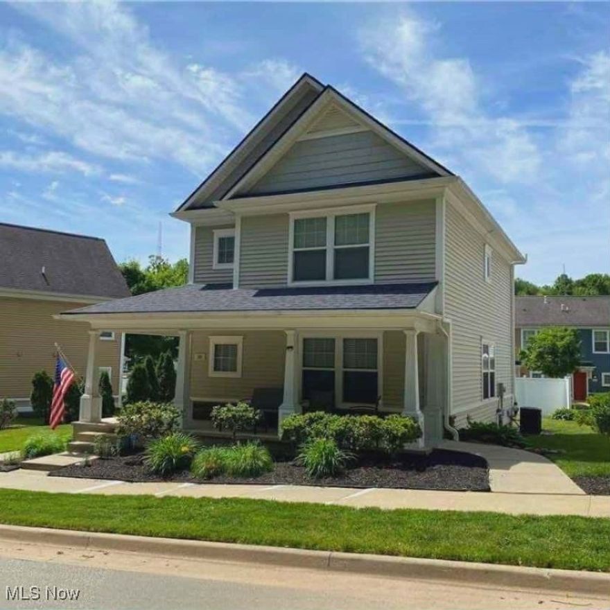 Built in 2006, this updated Colonial offers space, style, and a prime location near Elizabeth Park water park and Downtown Akron. This 4 bedroom 3 FULL bath home boasts 2,352 sq. ft. of thoughtfully designed living space—which includes the fully finished lower level that was just renovated in 2023, perfect for extended living, teenager living or large family. The heart of the home is a modern, open-concept Great Room with a large kitchen featuring a large center island that seats up to five—ideal for casual meals or hosting. Kitchen includes stainless appliances and Reverse Osmosis drinking water. The full bath completes the main level for everyday convenience. Upstairs, a large landing welcomes you to the primary suite which includes a walk-in closet and primary bath with double vanities, and additional door access from the hallway and primary bedroom. Two additional bedrooms on the second level offer comfort and flexibility for family or guests. The fully finished lower level expands your living space with a private bedroom with closet, sleek vinyl flooring, a newer (2023) luxury shower, and a spacious recreation room. Outdoors, enjoy the large, private yard (partially fenced), a wraparound porch perfect for relaxing, and a 2-car detached garage with overhead storage. Located in a friendly neighborhood just a half mile from downtown Akron, this home offers easy access to public transit, hospitals, major employers, and the city’s civic attractions. Nature lovers will appreciate the nearby Little Cuyahoga River, wooded views, and direct access to the Ohio & Erie Canal Towpath Trail. Move-in ready with an impressive list of updates—don’t miss this one! Schedule your private showing today!