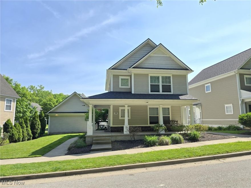 Welcome to 180 Elizabeth Parkway, Akron, Ohio – a beautifully updated Colonial offering space, style, and a prime location! Built in 2006, this 4 bedroom 3 bath home boasts  2,352 sq. ft. of thoughtfully designed living space—which includes the fully finished lower level that is currently a successful Airbnb rental or is perfect for extended living or entertaining. The heart of the home is the modern, open-concept kitchen featuring a large center island that seats up to five—ideal for casual meals or hosting, which looks over the spacious great room.  The full bath completes the main level for everyday convenience. Upstairs, the master suite includes a walk-in closet and an attached bath with double vanities. Two additional bedrooms and another full bath offer comfort and flexibility for family or guests. The fully finished lower level expands your living space with a private bedroom with closet, sleek vinyl flooring, a newer (2023) luxury shower, and a spacious recreation room.  Outdoors, enjoy the large, private yard (partially fenced), a wraparound concrete porch perfect for relaxing, and a 2-car detached garage with overhead storage. Located in a friendly neighborhood just a half mile from downtown Akron, this home offers easy access to public transit, hospitals, major employers, and the city’s civic attractions. Nature lovers will appreciate the nearby Little Cuyahoga River, wooded views, and direct access to the Ohio & Erie Canal Towpath Trail. Move-in ready with an impressive list of updates—don’t miss this one! Schedule your private showing today!