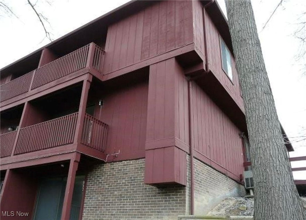 Beautiful, private, bright condominium in the Chaunticlair complex. This condo has been completely refinished over the past several years with all new and additional, energy efficient thermal pane windows & sliders, real oak wood flooring (main floor), ceramic and slate tile. The master bedroom is magnificent with a wood-burning fireplace, 18' of closet. The master bedroom entry and bath have heated ceramic flooring. Relax in the master 5' corner-bath whirlpool tub. Walkout basement with another wood-burning fireplace provides additional comfortable living space. This unit is one of the most private of all units in Chaunticlair as it is on the backside of the building, away from Creekwood Dr, facing woods. Enjoy coffee or a leisurely evening on the main floor or master bedroom deck. Deck off the walkout basement provides for leisure grilling & meals. Deck leading to the front entrance is also private and wonderful for an outdoor coffee or dinner.