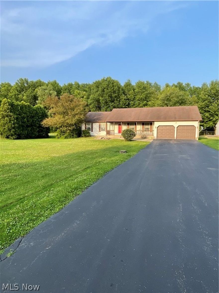 One floor living in Champion school district on .08 acres in a country setting! Master suite with walk in closet. HUGE family room with deck leading out to partially fenced backyard. First floor laundry. Home Warranty included! Call for your showing before its gone!!