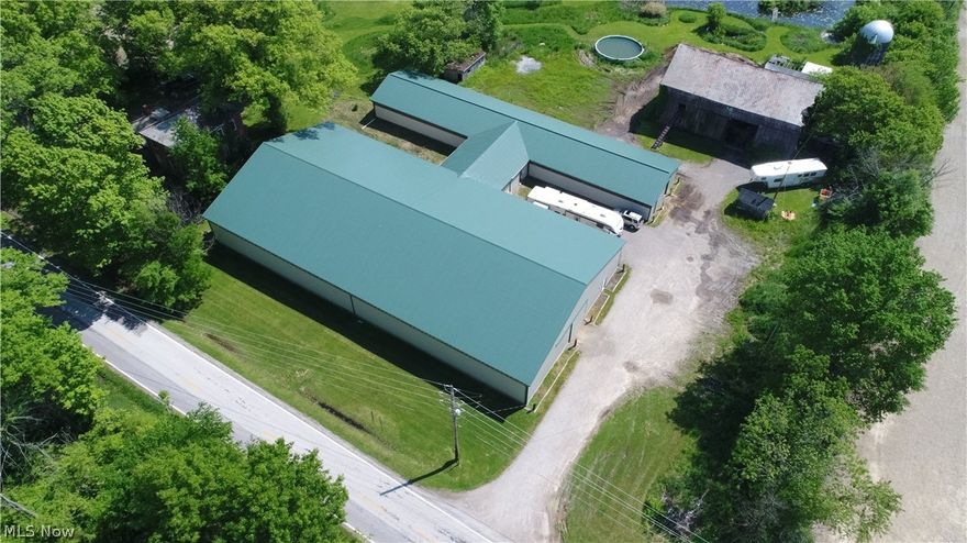 Fabulous opportunity to own an income producing equine boarding facility! Situated on 5.81 acres in Litchfield Township is this newer built barn with 21-10x11 stalls, wash racks, and attached 76x150 indoor riding arena. The property also includes an all-season turnout pasture, public water and electric. The barn is fully occupied with boarders and is ready for its next owner to enjoy this beautiful facility.  A home is located on the property as well, but the value is being given to the barn and established business. All old barns and pool have been taken down since photos  Don’t miss out on this gem!