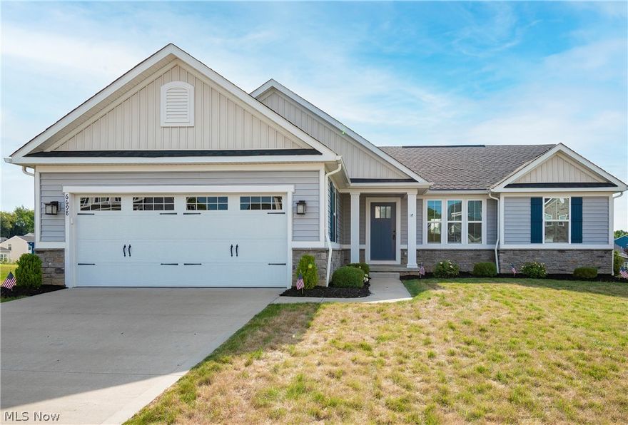 Located in the desirable Lexington Farms development, this stunning three bedroom, two bathroom 2018 ranch won't last long! Enjoy your open floor plan on the main level offering a dining room, spacious kitchen, and living room boasting a gas fireplace and recessed lighting. Find your culinary inspiration in this beautiful kitchen featuring maple espresso cabinetry, stainless steel appliances, and granite countertops. New 2020 deck sits off the kitchen and gives access to an oversized backyard and quiet neighborhood. Your main level owner's suite offers a large bedroom, walk-in closet, and full owner's bath with double sink vanity. Spacious full basement with plumbing for a bathroom and wet bar. First floor laundry. Conveniently located near local shops, restaurants, and Washington Square. Don't miss your opportunity to own this home! Schedule your private viewing today!