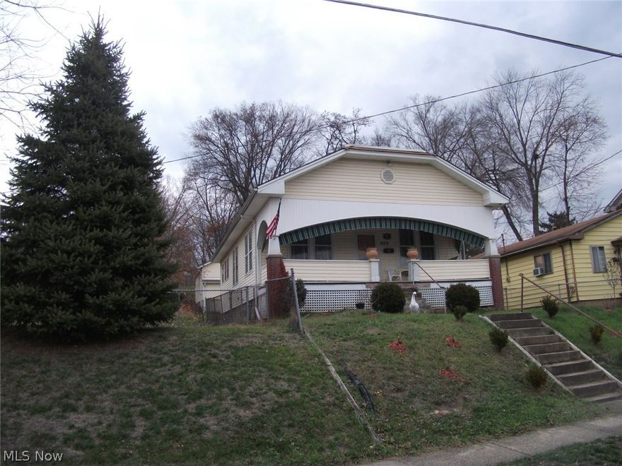 Cozy and comfortable. Large 26.4x11.10 living room with built in bookcases. Living room and
3 bedrooms are carpeted over hardwood floors. Cozy kitchen is a delight. Ceiling fans in
all rooms. Wide central hallway to all rooms. Electronic air cleaner on furnace. This home has
low utility bills. Garage and off street parking on paved alley in rear. Sidewalk to back porch.
Yard is fully fenced for kids and pets.