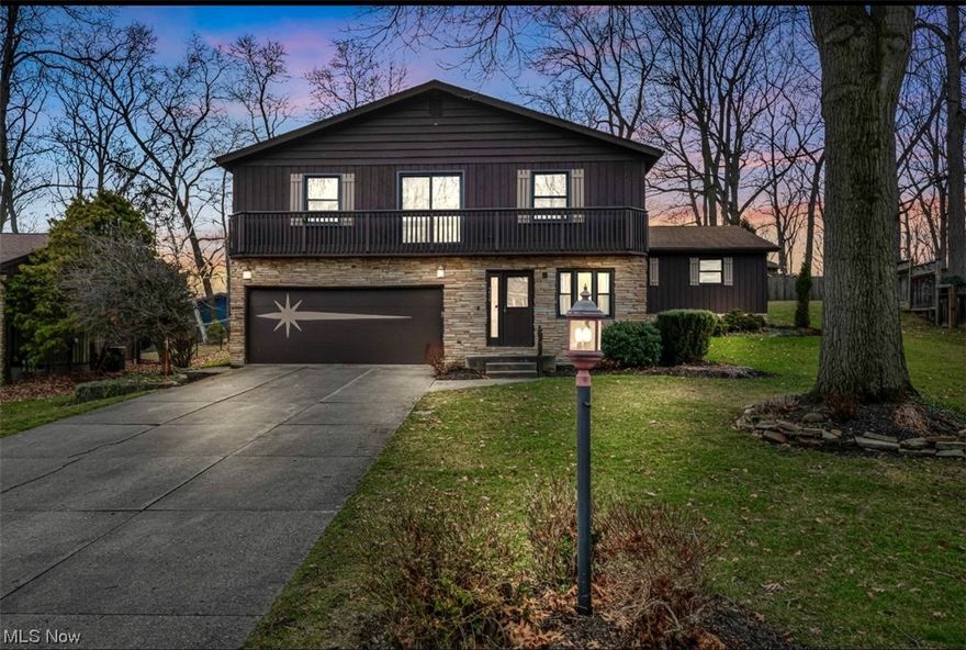 Don’t miss out on this beautiful, well-maintained four level home located in the well sought
after Wyoga Lake Estates neighborhood in Stow. This incredible 4 bedroom, 3 full bath, 1 half
bath home offers over 3,200 sq ft of living space. If you are looking for a mother-in-law suite,
this is your home boasting two master suites, with one on the main floor.
Enter into the family room with its own walk in closet for storage along with a powder room in
the hall. Next up is the eat-in kitchen that has maple Shrock cabinetry and laminate plank
flooring, with an oversized island that is made for chefs and bakers alike. Sliding doors off the
kitchen makes for easy access to the deck with a gas grill connected to a natural gas line. The
living room and the first of two master bedrooms with ensuite, and an oversized laundry room
with cabinetry and sink are also located on the same main level.
The next level up has a second master ensuite with a walk-in closet, along with two more
bedrooms and an additional full bath.
Don’t miss out on the amazing recreational room in the lower level which includes a wet bar.
Also on this level are additional hookups for washer/dryer, should you choose to convert
upstairs laundry to a mini kitchen for ensuite for a true mother in law suite.
This home is completed with an oversized garage with even more extra storage space.
Numerous updates throughout , a must see!
Wyoga Lake neighborhood is a development with 276 homes located directly across the street
from Walsh Jesuit High School and next to Cuyahoga Valley Christian Academy. The home is
located within the Stow-Munroe Falls City School District. Wyoga Lake Estates has an optional
HOA that is a great value. Join and enjoy a private lake for swimming, with lifeguards, boating,
pavilion, playground, basketball court, sand volleyball court, and more! This neighborhood also
has easy access to the Summit County Bike and Hike Trail with no need to go out on a main
road.