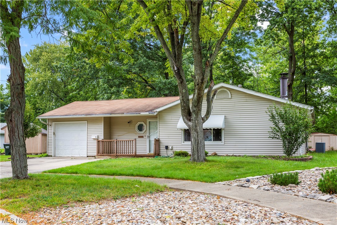 Welcome home to this adorable 3 bed, 2 bath ranch home nestled on a quite cul-de-sac. When entering the home you are greeted by a spacious living room that boasts a white washed corner fireplace with wood mantle. The vinyl plank flooring that is found through most of the home is new as of last year. The kitchen features tons of cabinets, plenty of counter space and all appliances stay! There is also a very large family room with corner wet bar and glass sliders that lead out to a wooden deck. Down the hall you'll find a full bath, 2 generously sized bedrooms and a large master bedroom with en suite bathroom and another set of sliding doors leading to the deck. In addition to the deck, the backyard also features a shed and wooden play set that will remain. Don't miss your chance to put your own finishing touches on this home in a great location and plenty of room to grow. Make an appointment today!