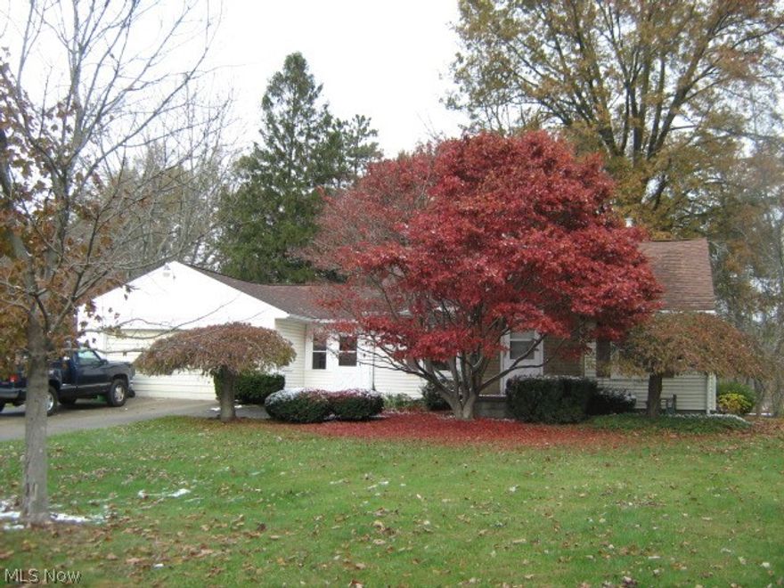 Remodeling has begun - add your finishing touches!  Freshly painted, newly carpeted! Sliders from dining room & family room onto 13x19 deck overlooking big, treed backyard. Vinyl replacement windows, vented glass block basement windows.  2-car attached garage plus 1-car detached garage for storage. Knotty pine paneled 9x10 breezeway.