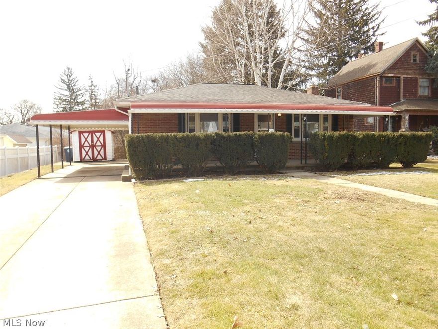 Welcome to this absolutely adorable brick ranch located in the heart of North Hill.  This home has two nicely-sized bedrooms and an updated bathroom.  There is an eat-in kitchen with new backsplash and fresh paint.  There is a basement that could easily be finished.  Enjoy coffee on your covered front porch. Don't forget the storage shed.  This is a great starter home.  It is completely move-in ready and awaiting a new owner.  Call to schedule a showing today!