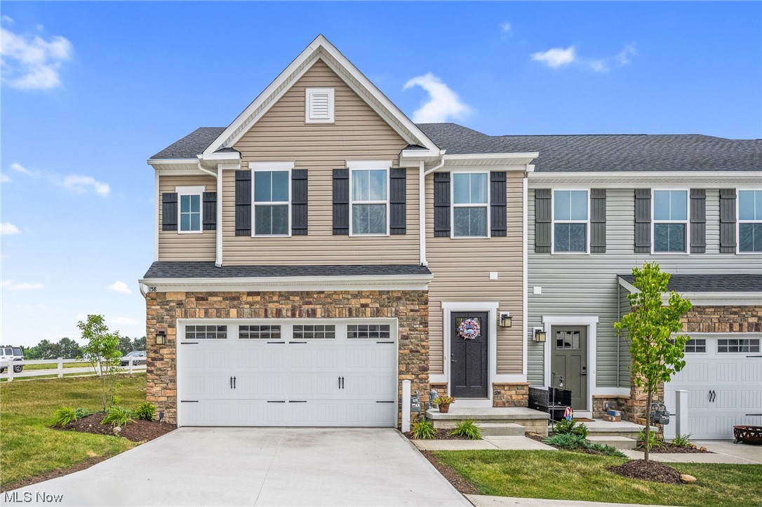 Welcome to this modern, open floor plan, move-in ready townhouse that's only 2 years young! Complete with a new stamped patio (2023), privacy partition fence (2023), newly poured driveway (2023) and a LONG list of builder added features/updates! This corner property is situated on a semi-private/premium lot and includes a wide open floor plan with 3 large bedrooms, 3.5 baths, a loft space, partially finished basement and an attached 2 car garage. Basement family/rec room features an egress window for emergency exits, a full bath and a large storage room that could be transformed into a bonus room, office or even a gym! Kitchen includes quartz countertops, an extended dining room, soft close drawers and all stainless steel appliances. Master bedroom provides 2 spacious walk-in closets, a large master bath with walk in shower featuring dual upgraded shower heads. Other upgrades include (but are not limited to), LVP flooring throughout main floor, extra lighting, an extended living room and SO much more! Embrace the opportunity to call this stunning property "home"!