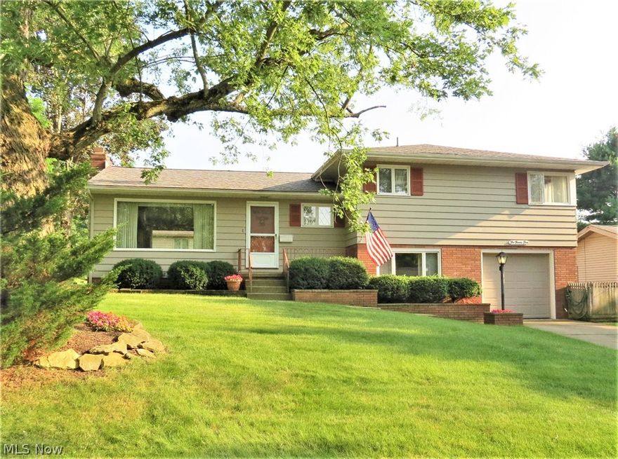 Absolutely charming, custom built, 3 bedroom, 2-1/2 bath, 4 level split on a quiet dead end street in Niles. This home features an entry foyer w large coat closet, huge living room with lots of natural light, nice carpeting over hardwood floors, wood burning fireplace & room for extended family & friends. Beatutifully updated kitchen, rich Kraftmaid wood cabinets, newer laminate flooring & all appliances stay. Bathrooms have been renovated. All bedrooms have overhead fans & are comfortably sized. One bedroom has built-in furnisnings complete with bunk beds, dressers, shelving & desks. Master bedroom with on suite bath featuring onyx walls in the shower, heat lamp, extra closet & more. This home boasts plenty of closet & storage space throughout. Lower level has a spacious laundry/utility room, a family room wich could be an office, bedroom or hobby room. The unfinished basement level has glass block windows, separate storage room, opening for a fireplace, should you choose to finish th