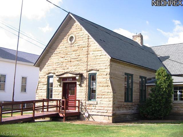 This property is now available with Lease Purchase or possibly Land Contract Please take a look at the pictures. This building was built in 1887. It's constructed of sandstone and is like a fortress. The exterior workmanship and detail are simply beautiful. The building has 3 big rooms. A kitchen plus 2 multipurpose rooms. Zoned commercial, the business person that sees this fantastic structure will realize its potential for antiques, art, music or I'm sure many other creative uses. Easy to see!