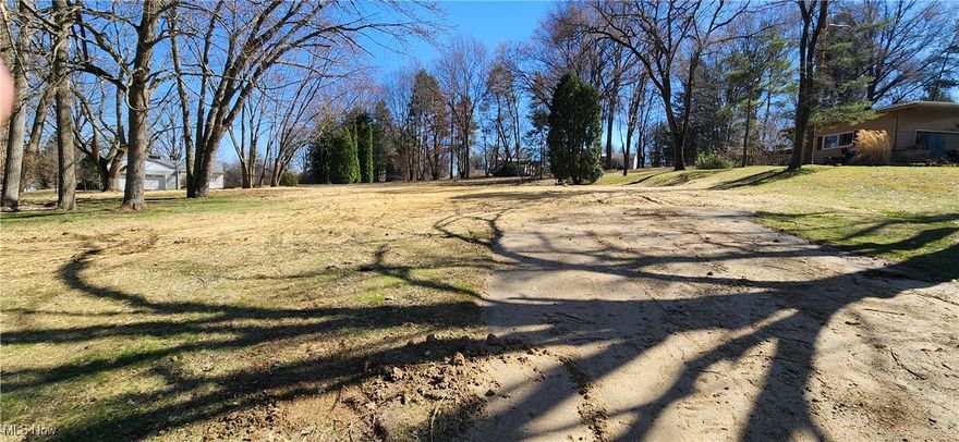 Nice 1 Acre Building lot in Coventry Twp, near Firestone Golf Courses.  Beautiful housing development with nice rolling land.  Gas, Electric, Sewer available. Previous house was on site- a portion of driveway remains. New tax valuation has not yet been assessed for this "land only" status. This is a Fannie Mae HomePath Property.