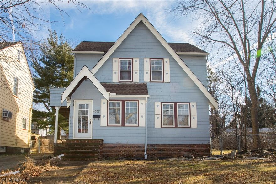 Prepare to be Moved!...Into this adorable updated colonial with open floor plan & double lot on quiet dead-end street in Old Brooklyn! Living Room has beautiful hardwood floors, fireplace and lots of natural lighting, which flows into the formal Dining Room with ceiling fan and plenty of light. Eat-in kitchen has ceramic tile flooring and plenty of cupboards for storage. Upstairs, 2 large bedrooms share the full bath. Additional sink in 2nd bedroom for extra convenience! Backyard has 2 car detached garage and fenced yard. The double lot / side yard provides privacy from neighbors and green space in an urban neighborhood. Updates include fresh paint throughout home (2018), new toilet and shower faucet, updated plumbing, and new flashing around chimney (2018). Convenient access to highways and downtown Cleveland; close to many amenities including Cleveland Metroparks Zoo, restaurants, schools and parks.
