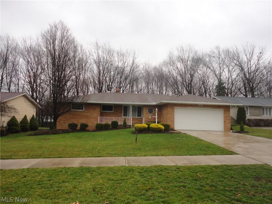 Solid Brick Ranch on a nice lot ! * 3 Nice sized Bedrooms and 1-1/2 Baths * This home has tons of upgrades! *  Newer driveway, sidewalk, walkway to the back porch and the walkway to the front porch has stamped concrete * Newer entry door and screen door * Newer Windows * Newer Roof * Newer Garage Door * Updated Main Bath * Slider off of the Family Room leads to the covered porch * Wooded rear lot with a wood fence * 1/2 Bath off the Family Room with a new vanity and toilet * Gorgeous Kitchen with newer cabinets, counter tops, sink and built in cooktop *  Appliances stay * Extra updated electrical panel * Rheem furnace with humidifier * Partially finished Basement with glass block windows (5 are vented) *  Gorgeous hardwood floors * Naturestone garage floor * Must see this beauty !