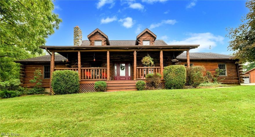 *CUSTOM BUILT One Owner ~ Log Cabin Home W/3,200 Sq. Ft Boasts 5 Bdrms, 3.5 Bathrms, Includes FINISHED Walkout Basement, 2 Car Attached Garage & Multiple Outbuildings On 3.6 ACRES!! *FENCED IN Property W/Relaxing Front Covered Porch, Stocked POND W/Catfish, Bluegill & Bass, DOCK For Fishing, Zipline & Platform, Koi Pond, PAVILION, Stamped Concrete Patio, Pig Spit For Roasting & Double Decks! *2 Level Barn W/Concrete, Electric, Loft & Covered Patio! *2nd Outbldg. Includes 12 Covered DOG KENNELS W/Ac Units & Heater - Back Rm W/Tall Ceiling - These FINISHED RMS Could Be Used For Anything! *3rd Outbldg. 28x40 HEATED GARAGE/SHOP Woodworking Area, 9 Lights, Water, Include Storage Rms, 1/2 Bath + More *2 Covered Carports For Storing A BOAT Or Trailer, Covered Wood Shed ~ Amazing Find! *Dramatic 2 Story Great Rm W/16 Light Chandelier & Stone Fireplace! *Two 1st Floor Bdrms Include A Master W/Walk In Closet + Ensuite Bathrm *Dining Open To Kitchen W/Breakfast Bar *Gorgeous Vaulted Ceiling SUNRO