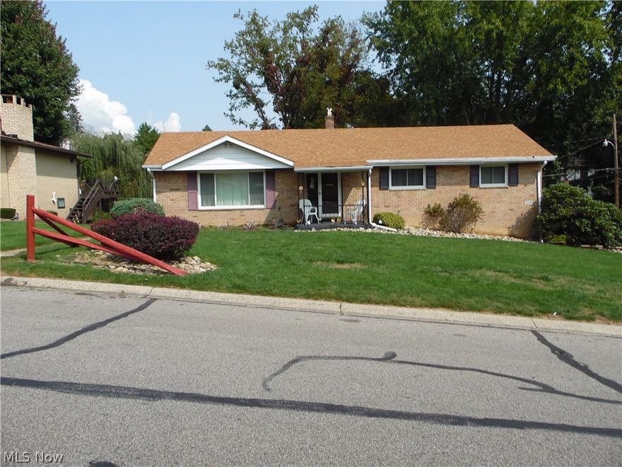 Brick 3 bedroom 2 bath in quiet neighborhood close to all amenities. Updates  include: new granite countertop in kitchen; all new windows throughout except the dining room and furnace and central air 9 years old. Beautiful deck and flat backyard along with eye catching landscaping in the front yard. 2 car garage and bar in recroom and full bath in basement. Motivated sellers!!!