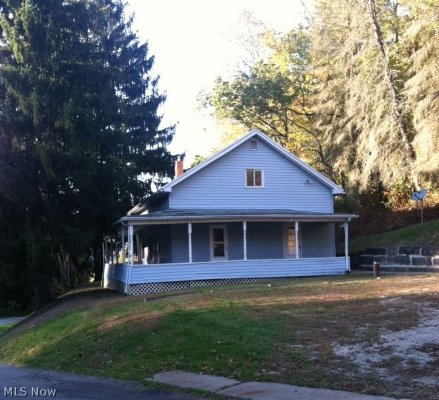 Your own country acre comes with this cozy century home.  The upstairs has 2 large bedrooms and abundant storage.  The main floor has an eat-in kitchen, living room, family room, bathroom and laundry room.  In the last 5 years, the furnace, metal roof, water heater, chimney liner, and well pumps  have been replaced.  Home sells "As-Is"