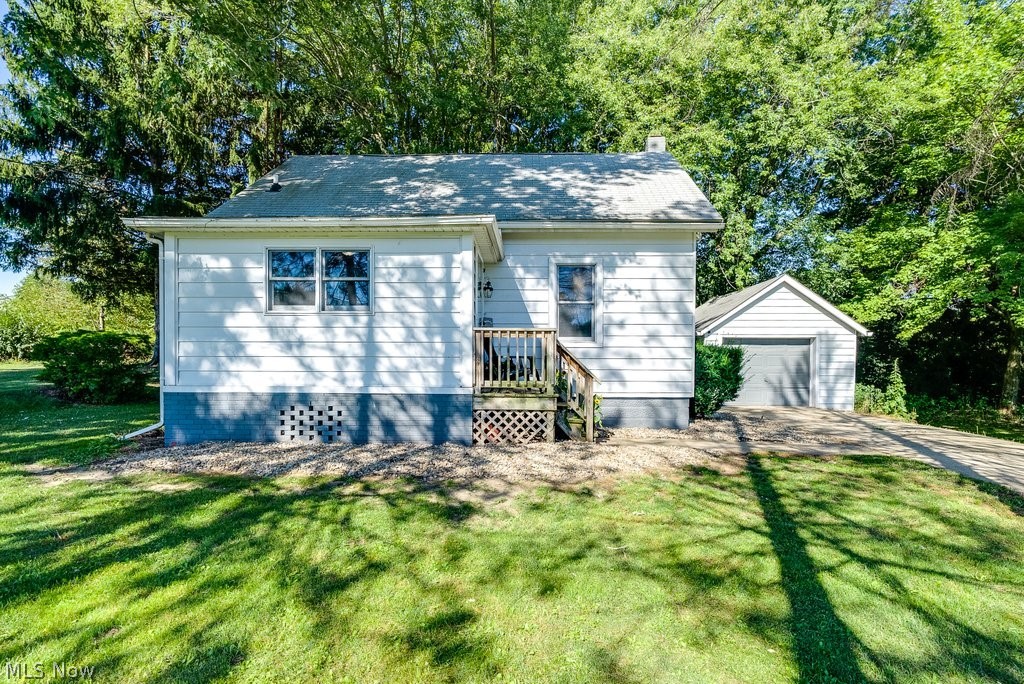 Just listed this super cute 3 bedroom starter home in Marlington Schools! You will love the current color schemes throughout, with newer flooring, updated kitchen and baths, roof less than 5 years old! Nice large living room with room to spread out, lovely kitchen which includes newer stainless steel appliances, stove, refrigerator, and microwave. Super nice wide yard on nearly an acre of land with two parcels, with a one car garage and extra storage shed for your mower/gardening supplies. Great location, on a nice quiet rural setting. Call today!