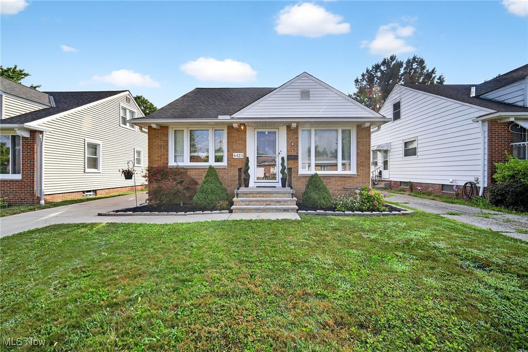 This Brick Front, Vinyl Wrapped Beauty Has More than just Looks! This Quiet Street in Parma Circle is a Hidden Gem with EVERYTHING at your Fingertips! Stroll around Ridgewood Lake, Stop at the Splash Pad and Playground, Take a Photo with a Parma sign and Grab Lunch at The Shoppes - You will have traveled about a mile in total! Now, You're HOME - 6423 Keltonshire Rd - Arriving on a Cement Drive in Excellent Condition, Parked in Your Two Car Garage and Enjoying Privacy on the Back Patio with Covered Pergola within the Fenced Backyard. The Newer Fencing will Provide Many Years of Easy Living, Keeping Pets Secure and Allowing Enjoyment of a Small Playground and/or Pool for Little Ones. Adults can have their Fun "Two" with Two Patio Options for Entertaining or Unwinding! Inside, the Immaculately Kept Hardwood Flooring Flows Through the Spacious Living and Dining Rooms which Benefit from Ample Natural Light, Provided Through Picture Windows in Each Room! The Kitchen Boasts an Updated and Airy Feel with Light Colors, Tasteful Updates and a Roomy Design! Both First Floor Bedrooms are Well Sized and Feature Cozy Carpets. The Full Bath has been Fully Updated (as has the other) Featuring Modern Tiled Floors with Updated Fixtures and Cabinetry. There's even Space for a Make-Up Station or Extra Storage! Heading Upstairs is the Owner's Retreat with an Expansive Carpeted Bedroom that Offers Two Closets and Plenty of Space for Dressers, etc! The Cherry on Top is the Finished Space Downstairs! The Second Full Bathroom with a Beautifully Tiled Shower Services this Space! The Main Finished Room is Sizable and Enjoys the Comforts of Newer Carpeting. A Secondary Finished Room Offers Versatility as an Office, Exercise Area, Play Room, etc! Don't Settle for the typical Parma Bungalow - Tour this Generously Sized and Perfectly Located Gem Today. This is Your Chance to be Just the 4th Owner of this Lovingly Cared For Property! You'll See Why it Rarely Changes Hands!