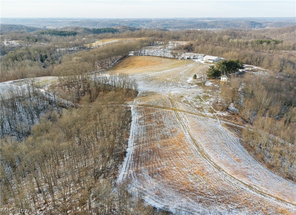 Located in southern Tusc. County just 5 minutes south of Newcomerstown here’s a property that offers several options to a potential buyer. Whether you’re looking for a homestead with plenty of elbow room, or a proven trophy property with living quarters and storage building already in place, here’s an excellent opportunity for you.
Parcel 2: 118.31 Acres with 50 ft of road frontage. This parcel has approximately 8.5 acres of open hay ground with the remainder being wooded. Several pipeline easements cross this land, adding some additional open ground. Several nice-sized food plots give you numerous hunting options. This is very accessible hunting parcel with well-kept trails traversing the property.
The timber and 50% of the minerals make this an excellent investment. You need to drive this to fully appreciate this exciting opportunity. Walk or drive the land at your convenience and risk or come to the property preview Wednesday, February 1st from 3-5:00 PM. A portion of the prope