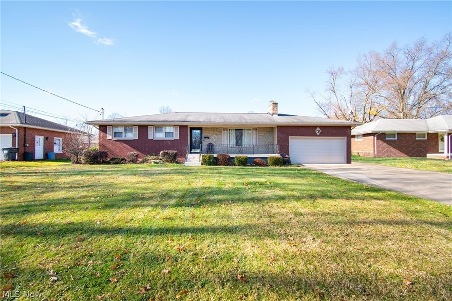 If it's a beautiful brick ranch you're looking for, you've found it! UPDATE since previous listing, vacant and ready for immediate possession! NEW LVT wood flooring in living room, dining room, hallway, and kitchen. NEW Range, refrigerator and microwave. Call Today! This 3 bed, 2 1/2 bath home is conveniently located in the Cornersburg area, within Austintown school district. Upon entering, the living room welcomes you with a fireplace and large picture window looking out onto the covered front porch. Down the hall, you will find 3 bedrooms, a hall closet and a full bathroom with double sinks. The dining room opens up to the bonus room addition offering plenty of windows and access to the fenced in back yard and deck. Making your way into the large eat-in kitchen, you'll be pleased with the cabinet space, large picture window and half bath with built-in cabinets for storage. From the kitchen, you have access to your 2-car garage and basement. Offering tons of room for storage, along with a separate back room and full bathroom, the basement is ready for your final touch to make it your own.