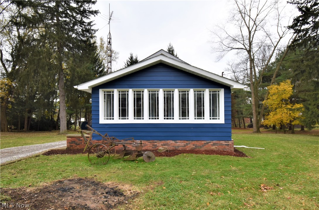 Welcome to 3060 Hayne Rd, a gorgeously renovated 2 bedroom/ 1 bathroom ranch sitting on three lots! This home has loads of character with original natural woodwork and new luxury vinyl plank flooring throughout. Enter into a spacious mudroom on the main with laundry hookups. Continue into the kitchen boasting brand new cabinets, butcher block countertops and brand new stainless steel appliances. Remodeled bathroom features a gorgeous clawfoot tub! Additional room with French doors extends off the living room. Spend your evenings on your large enclosed front porch with it's shabby sheek finished ceiling. Backyard includes a chicken coop and a small barn that can be used as an animal barn or storing lawn equipment. Enjoy your spacious yard and quiet street while still being close to downtown entertainment. New interior and exterior paint. Full basement. Furnace, HWT, electrical panel, range, fridge, microwave, dishwasher all 2021. Don't miss your opportunity! Schedule your private view