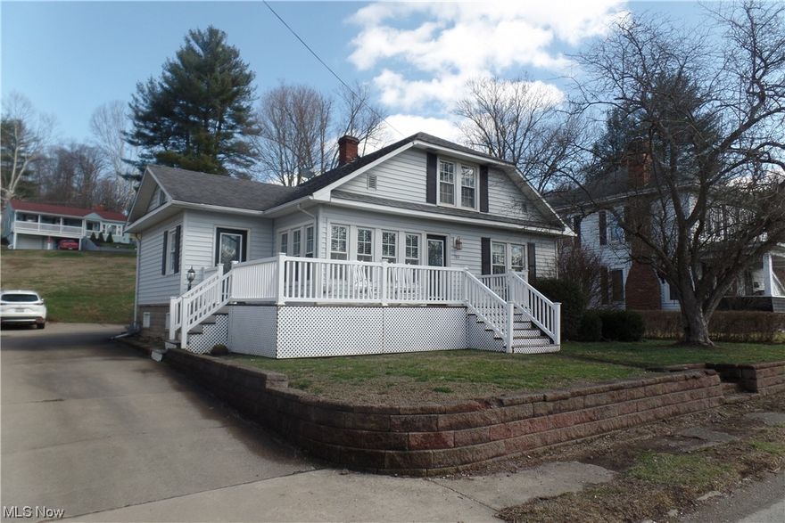 4 bedroom 2 bath home with a paved driveway and a 2 car garage. You will be surprised at the space in this home with over 3400 square feet! The roomy 22x13 living room leads to a great sunroom. The lower level has a nice size family room with a built-in bar. There is a large deck to enjoy your morning coffee. Located close to parks and the public library. This is a must see!