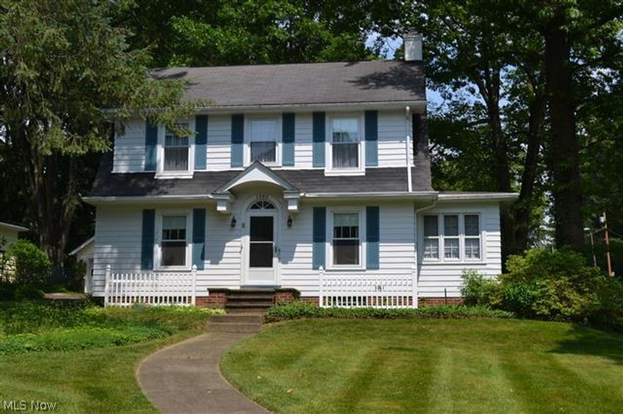 Lovely Dutch Colonial close to College of Wooster. This wonderful home is full of 1930's charm from the built-ins to the glass door knobs.  Enter into the inviting living room with gas log fireplace and adjacent sunroom, which would make a great study or office.  The dining room features hardwood floors and built-ins and the kitchen is full of wonderful natural light.  Completing the first floor is a handy half bath near the back entrance.  Upstairs there are three bedrooms and a large full bath plus a full one bedroom apartment with a large living room, full bath, kitchen and separate entrance. The apartment would make a great in-law suite or turned into a wonderful owner's suite. Recent updates include newer vinyl windows, new furnace and seller believes there is hardwood floors under the carpeting. Bring your personal decorating touches and turn this into your lovely new home.