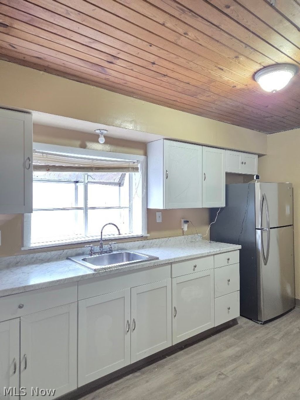 Photo of 9006 Columbia Avenue, Cleveland, OH 44108 (MLS # 5194494)