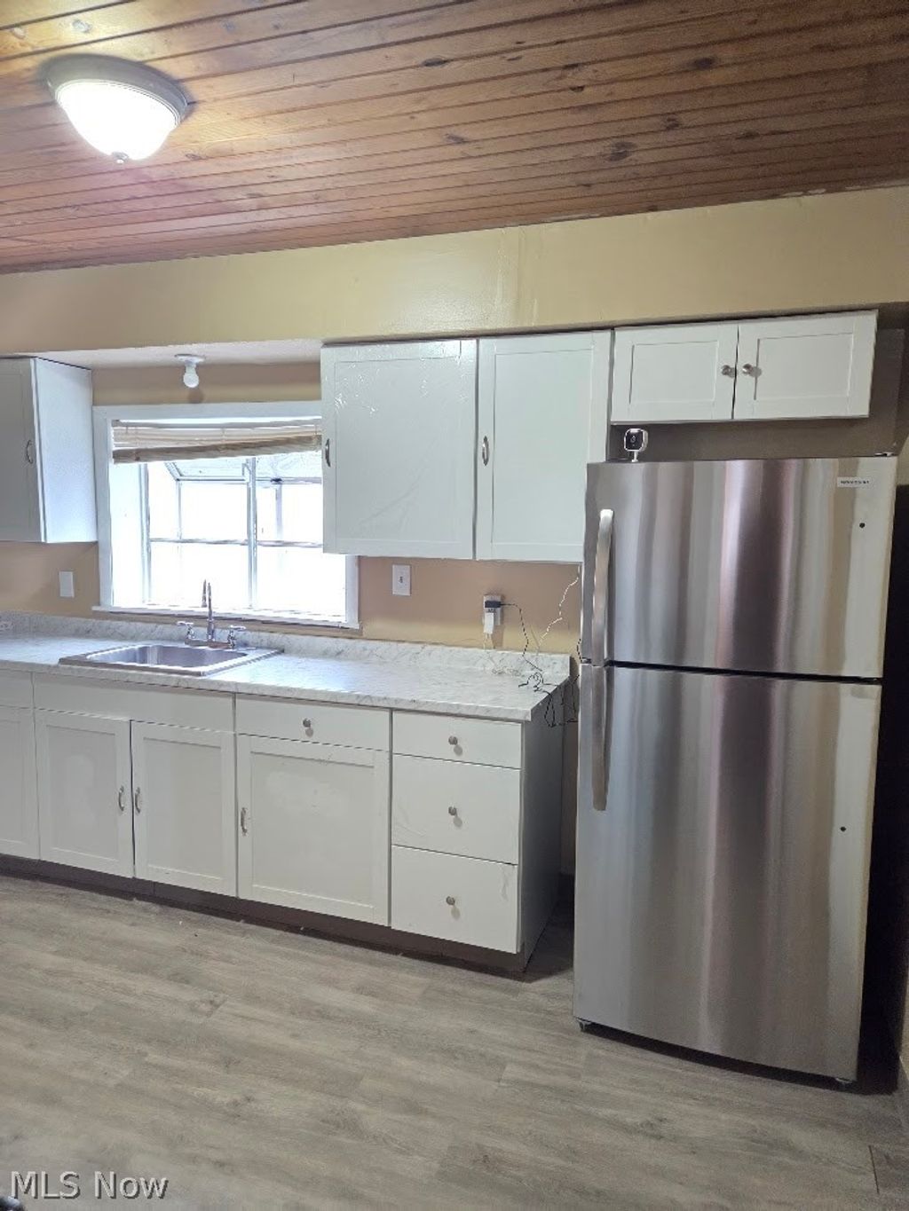 Photo of 9006 Columbia Avenue, Cleveland, OH 44108 (MLS # 5194494)