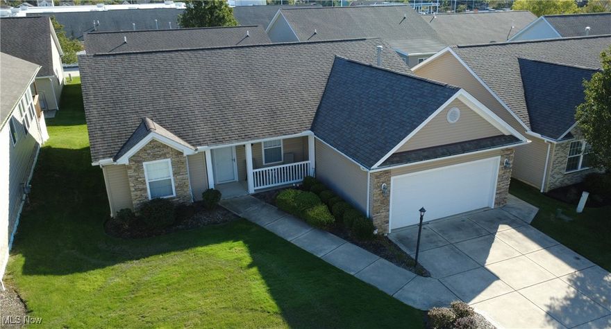 Discover this inviting ranch-style home in Autumn Hill Estates, an exclusive 55+ community in Seven Hills. Built in 2007, this beautifully maintained residence offers the ease of first-floor, maintenance-free living with 1,603 sq. ft., 3 bedrooms, and 2 full baths — all thoughtfully designed to be wheelchair accessible. Come through the foyer into a bright, open-concept living area featuring a spacious kitchen, dining room, and cozy living room with a fireplace — perfect for relaxing or entertaining. From the dining area, go out onto the peaceful back deck and take in the beautiful sunsets. The primary suite offers comfort and convenience with a private en suite bath and walk-in closet. Additional highlights include newer appliances (refrigerator, range, dishwasher, washer and dryer) and access to the community gazebo, where neighbors gather and enjoy the outdoors. Experience comfort, convenience, and community all in one place — welcome to Autumn Hill Estates!