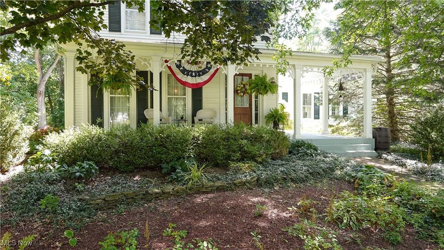 Beautifully updated and maintained century home in the center of the historical distract of Aurora.  This iconic home sits on almost an acre of land and offers all the convinces of a modern home with the charm and beauty of a grand historical estate.  The owners updated the kitchen and bathrooms and added a 2 1/2 car garage with full in law suite above it with its own heating and AC unit.  
The home features restored hardwood flooring throughout, high ceilings, beautiful wood work on the baseboards, ceilings and windows, wood burning fireplace, and wrap around front porch.  The first floor offers a full on-suite with full bathroom, home office and laundry room as well as a beautifully updated kitchen that respects the charm of the home while offering state of the art cooking and dining features.  
Imagine walking to shopping, dining and parks right outside your font door while enjoying a spacious lot in the privacy of your back yard.  Call and set up a private showing before its gone.