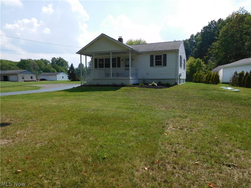 1.06 Acres of private and peaceful country property. Exceptional totally updated 1 bedroom 1 bath home (second bedroom easily added with wall), fully equipped oak kitchen with pantry,  beautiful bamboo flooring throughout, spacious all white bath, 2½ car garage with loads of additional parking for all your toys. Updates include newer electric, plumbing, roof, siding, glass block windows in basement, water proofed basement, and septic. Residence shouts pride of ownership. A very rare find in Hubbard. Priced for a quick sale! Call before it's GONE!