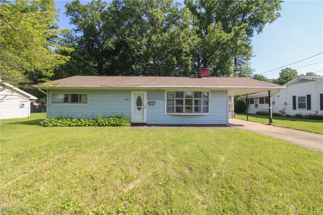 Your Austintown home search stops here, you've finally found "THE ONE"! Your convenient 3 bed, 1 bath 1,150 sq/ft slab ranch is located in the very sought after Kirkhaven Estates in the Austintown school district. You're going to love your brand new carpeting w/extra thick padding for that comfy feeling while walking barefoot! Your new home has been freshly painted w/todays light grays/beige colors that todays modern buyers want. Mom will love her spacious kitchen w/vaulted ceilings, stunning light brown cabinetry, modern tile floors, Samsung refrigerator, & your BRAND NEW Samsung oven! The Whirlpool washer & Maytag dryer come w/your new home & has a shelf above for your convenience. Your living room has a large bay window providing tons of natural sunlight, vaulted ceilings, modern wood closet doors, & a stunning brick fireplace creating a relaxing ambience no matter the season! Enjoy the cool breeze from your newer mini split ac wall unit (2023) for those hot & muggy Ohio Summers! Your oversized bedrooms have large closets perfect for storage, and large windows providing tons of natural sunlight! Enjoy a bath or a shower in your updated bathroom that has a newer vanity & ceramic tile flooring. Now for the best part...Looking for an additional bedroom, or a sunroom/workout room? Done! Just walk through the french doors in your kitchen to find your oversized bonus room! With tons of natural sunlight, this oversized room is perfect for a workout room, relaxing sunroom, or even your main bedroom, giving you access to your own private patio! Through your sliding glass doors you'll find your private concreted patio, perfect area for those summer family cookouts! Your large fenced in back yard not only comes with 2 newer sheds (2019), but is perfect for the kids summer fun! Roof is newer (2020), new hot water tank (2025)! You have a convenient single space carport, which is perfect for any size car or extra storage. This adorable home will go fast, make it yours TODAY!