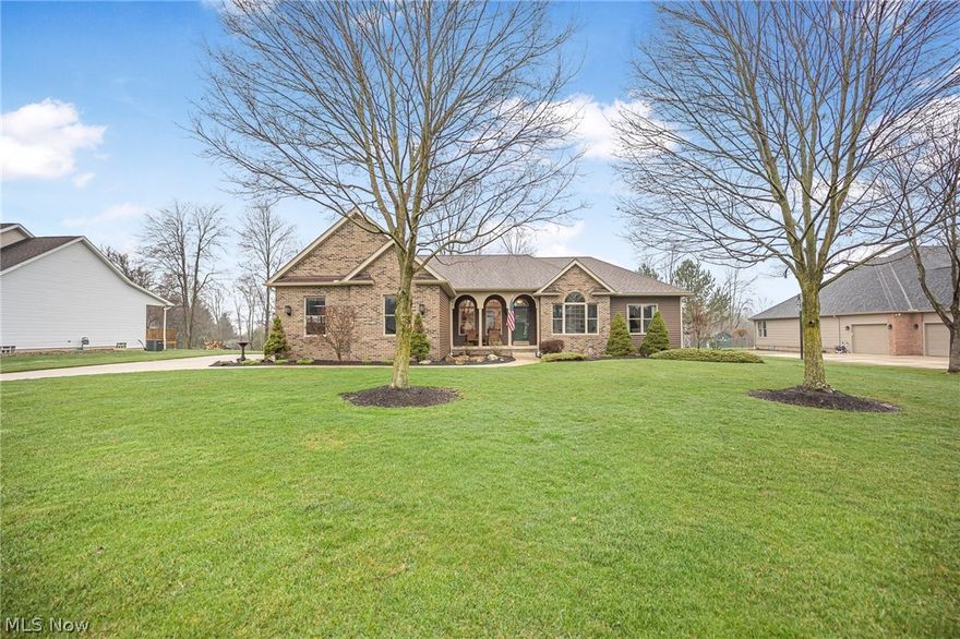 Nestled in the serene Valley Estates, where each home graces a minimum of one acre, this custom-built ranch by Mason Builders epitomizes the essence of tranquil living on 1 floor!  Boasting stunning views, its design celebrates an open floor plan that invites natural light at every turn. Central to its charm is a great room, complete with a majestic floor-to-ceiling wood-burning fireplace with gas starter, setting the stage for memorable gatherings. This home features three generously sized bedrooms and three-and-a-half bathrooms and 1st floor laundry ensuring comfort and privacy for all. The finished basement, an expansive 1525 sq.ft. space, offers a walkout to the backyard, full bath, ample storage, and a dedicated workshop, catering to hobbies and leisure alike. Recent upgrades enhance its appeal, including appliances, updated baths, newer flooring, new siding, soffits, gutters, and a garage door, complemented by a nature stone flooring in the garage for a touch of elegance. With a roof replaced nine years ago, this property combines timeless design with enduring quality. A three-car garage and sprinkling system adds convenience. The backyard is park-like with a meandering stream and many trees. Seize the opportunity to own a piece of paradise in Valley Estates.