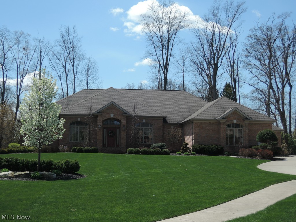 Totally unbelievable custom brick ranch with completely finished walk out basement. 11 foot ceilings. Extensive custom crown moldings, 5 in baseboards. On the 1st floor is 2 bedrooms & full bath on one side. Oversized great room. Den with french doors. Formal dining. Large kit with granite, built in micro/oven, dbl DW, eating bar plus eating area. Fla Room (2011) Laundry... mud area and 1/2 bath. Master suite is amazing!! Large bedroom..custom bath with glass and ceramic shower, whirlpool tub oversized custom closet. Off the master is another 1/2 bath leading to a pavillion room with hot tub (2011)w/ special ventilation and full kitchenette w/ french doors to the inground pool (2008). The lower level is just as amazing! Oversized rec room with wet bar & sliders to a patio, custom theater room with custom chairs, projector & screen. 4th Br..full bath..exercise rm, game rm, play rm all with carpet, recessed lights, drop ceiling. The property abuts Tippecanoe golf coarse (prop goes past fence) Inground sprinklers. Fantastic private cul-de-sac location on almost an acre. Must see to believe! Many more pics that will not fit. The auditors office doesn't reflect the additions nor the entire finished basement.