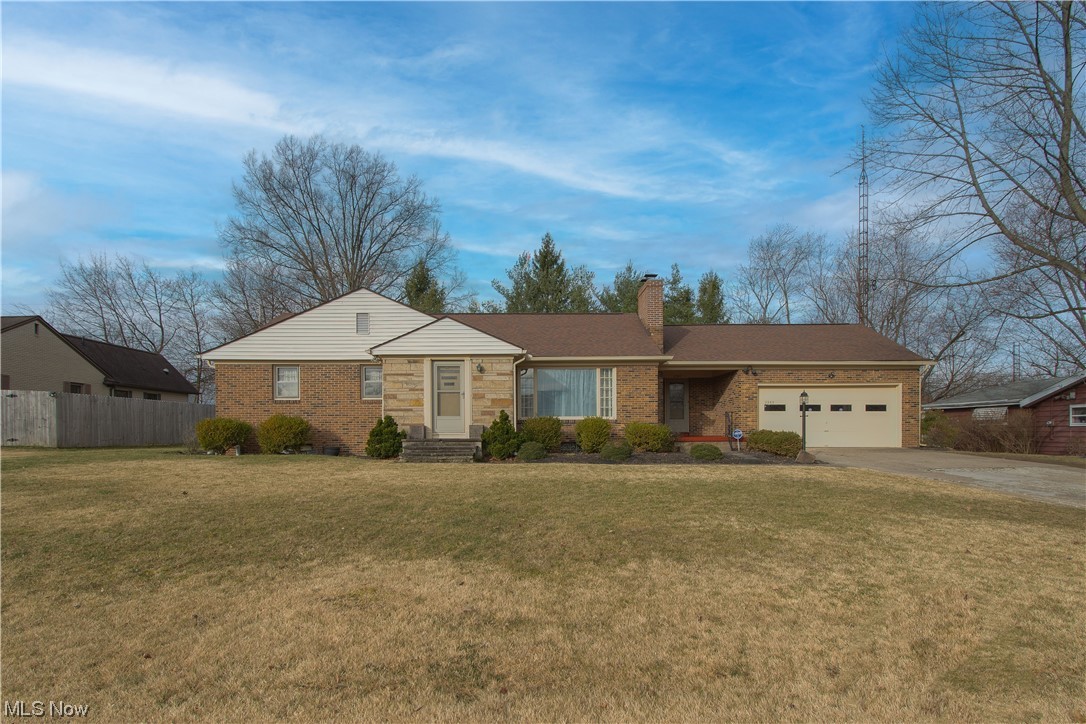 Look at this charming three bedrooms, two baths, two-fireplaces brick ranch home. This lovely home offers over 2,000 sqft of bright, spacious living space with hardwood floors under the carpet. You will love the great room with a wood-burning fireplace/a beautiful white mantel, and abundant natural light from the large picture window. Straight ahead is the formal dining room w a tasteful light fixture/a walk-up attic/chair rails/ and a walkout to the 3-season room w access to the concrete patio and private backyard. Adjacent to the dining room is the eat-in kitchen with a dinette area, a pantry, appliances, and plenty of cabinet space. The main floor has a full bath (with a standing shower/soaking tub/linen closet), three bedrooms, a convenient laundry chute, and many built-in drawers/storage. The partially finished basement/rec room with a fireplace, glass block windows, and a full bath is perfect for entertaining friends and family. There is also a large laundry area and lots of stor