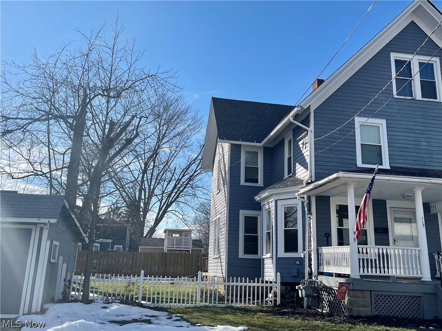 Located near the heart of Medina is this charming colonila half duplex. The property includes the left half of the home, and the right side of the garage. As you walk in the front door you're greeted by the spacious and comfortable family room. The dining room with built in decorative and charming cabinets follows into the kitchen you'll find plenty of cabinets and counter space. There is an adjacent half bath that also serves as your convenient utility room, complete with washer and dryer. Upstairs you'll find 3 spacious bedrooms, and a full bath. The basement offers peace of mind knowing it's been fully waterproofed and is ready for your finishing touches. The furnace was replaced in 2015, sump pump in 2017, and the roof and windows in 2020. Relax in the evenings on your back in time front porch, or entertain out back on your two tier deck! Close to all the shopping and restaurants in Medina square! Call for your private showing today, and welcome home.