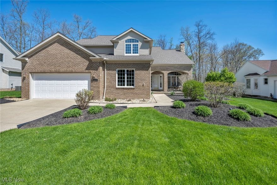 A unique opportunity to own this spacious custom-built, one-family-owned home situated on Hole #8 of the Glen Eagle golf course, on over 0.44-acre premium treed property in the desirable Ethan's Green community in Twinsburg City. This home offers a total of 4 bedrooms, an extra-large first-floor den that can be used as additional bedroom or living space, first-floor guest/in-law suite bedroom with full bath, and 3 full bathrooms. With over 3,232 square feet, a full basement with lots of potential, and an eat-in kitchen that includes ample cabinetry, a center island, stainless steel appliances, and a breakfast nook with access to the backyard deck, there is plenty of everyday living and entertainment space. There are two fireplace that add to the warmth of the this home. Upstairs, all bedrooms are generously sized, including a loft area and a spacious owners' suite with sitting area and beautifully updated en-suite bathroom with double vanity.  Enjoy a large deck overlooking a wooded, park-like backyard with a firepit area and volleyball space. A two-car heated attached garage completes the tour. The home has been well-maintained throughout the years, but recent updates include: roof (2024), master bath renovation (2023), first floor flooring replaced (2022), washer (2023), dryer (2021), dishwasher (2025), water heater/ac/furnace (2014) stove (2022), and refrigerator (2021). Conveniently located near I-422, I-480, Turnpike, lots of parks, Aurora Farms Premium Outlets, nature trails, dog park, Community Rec. Center, daycares, schools, restaurants, country clubs-golf, and many other local attractions. INCLUDED are all kitchen appliances, washer/dryer, window treatments, firepit, and surround speakers in the family room. This home is a must-see!