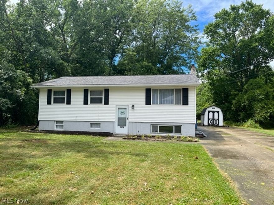 Very nicely updated and maintained bi-level home with huge yard. Lot is 1/2 an acre and clear- surrounded by woods. Great park like setting! Home has new carpeting in all bedrooms and family room. Pleanty of space to spread out. The kitchen has been updated with new stainless steel applicances. Clear and bright and ready with move in ready condition. Kitchen has a large dining area for entertaining that is open to living room. Bathroom has ben updated with new vanity and sink. Double wide drive way will hold at least 8 cars. Great home and a pleasure to show. See it today while it lasts.