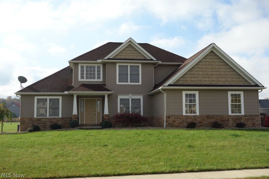 Gorgeous home with three car garage and desirable first floor master suite.  The two story foyer and open stair case are beautiful amenities.  An open floor plan makes entertaining a breeze.  Formal dining room with tray ceiling and hardwood flooring.  The kitchen has a large walk-in pantry, island and pretty cupboards.  A breakfast area off the back is surrounded by windows allowing for natural light to flow in.  All bathrooms have gorgeous, granite counter tops. Laundry is on the first floor for convenience.  Swing set stays!!