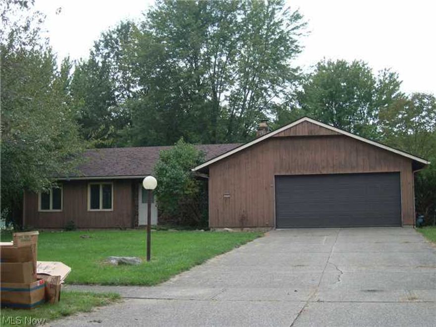 MILLS CREEK * 3 Bedroom, 2 Full Bath RANCH w/ an Attached 2.5 Car Garage built by Bob Schmidt. List Price reflects exterior that requires a Roof, Gutters, Downspouts, Cedar Siding Repairs & Staining. Interior requires Room to Room Rehab from the Flooring, to the Paint, to Light Fixtures, Patio Screen Doors, etc... Kitchen & both Bathrooms require updating too. The Seller has limited to NO knowledge regarding the property & it will be SOLD "AS IS" * Submit offers on line, via email or fax with a pre-aprvl OR proof of funds.