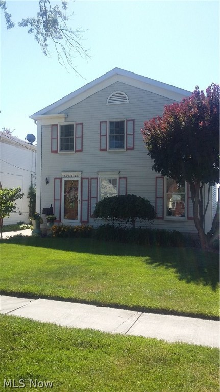 Absolutely immaculate and tastefully decorated Colonial near shopping, parks, and pools. Front and side entry for your convenience. Spotless kitchen with stainless steel refrigerator and oven/range connects to both 1/2 bath and DR. Dine and entertain inside or out back on the patio with mounted natural gas grill. Relax in the LR with lots of natural sunlight. Rest easy with 3 BRs (1 currently used as office) and full bath on 2nd floor. Lower level boasts rec room, spacious laundry room (w/d do not convey), and workshop which includes hand-built work bench and fluorescent lighting. Step outside into the 2.5 car garage, or set up horseshoes in the large wraparound back yard. Tons of updates; please refer to supplements for dates and details.