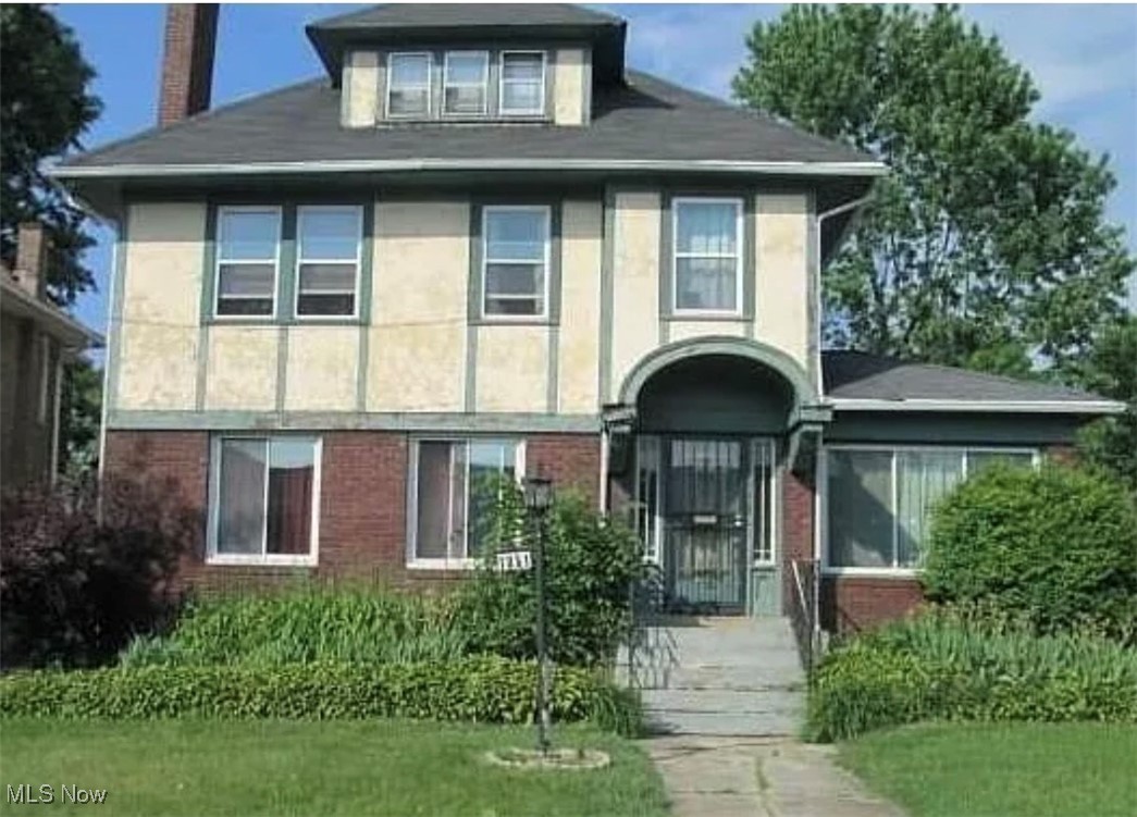 You will be WOWED by this large Colonial with more than 1900 sqft of living space located in East Cleveland. This home has 4 bedrooms, 2 full baths and 1 half bath. This home features hardwood floors, a brick fireplace, built-in cabinets, a sunroom, coffered ceilings, full partially finished basement and a third floor living space. Bring this home back to its full potential with your personal touched and you will not be disappointed. Schedule your private tour today.