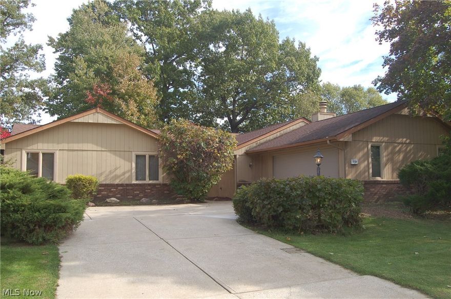 This is what they mean by LOCATION, LOCATION, LOCATION, prime lake view property in Aurora Shores with award winning Aurora school system. This three bedroom, two and a half bath offers one floor living with a spectacular view of the lake from almost every room. The large family room has a stone faced heat circulating fireplace and a wet bar that can be accessed from the family room or the living room. The kitchen, where people spend most of their time, looks right out on to the lake and is plenty big enough for a nice sized table. Living room and dining room are one big room with access to the wet bar and also look right on to the lake. Down the hall are the three bedrooms and two full baths. The master offers a walk-in closet, full bath with sauna, Jacuzzi tub, and sliding glass doors that lead to your private deck overlooking lake.  There are two other bedrooms and another full bath. There is a covered back deck with access form the living rom and master bedroom, and another large d