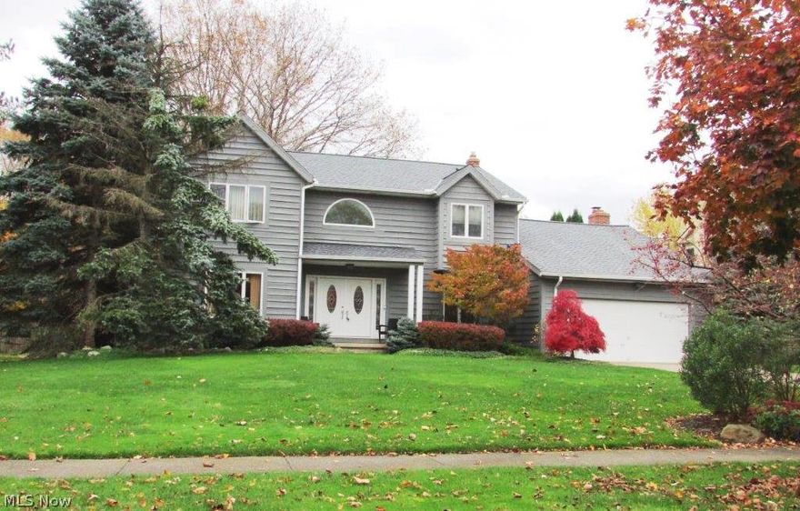 Fabulous Spacious Home in a beautiful suburban setting. Close to schools, shopping, freeway access and entertainment. This home features four bedrooms, 2 full baths and 1half bath. Formal Living room and Dining room with natural hardwood floors, 1st floor office/bonus room, 1st floor laundry room. Completely remodeled kitchen features granite counter-tops, ceramic floors, stainless steel appliances, hardwood cabinetry, center island, glass cook top. Eating area is adjacent to sliding door which leads to the private backyard. Family room features two story vaulted ceiling, wood burning fireplace with gas line, beautiful view of backyard. Master bedroom features vaulted ceiling, 2 walk in closets, master bathroom with large jetted tub, walk in shower, 2 sinks, vaulted ceiling, abundant natural light. Newer high efficiency furnace features electronic air filter and Aprilaire. New Roof is approximately one year old. Backyard features multi level deck, swimming pool, hot tub, dining areas and plenty of areas to relax. Very large full basement is partially finished. Must see to appreciate! Excellent Value!